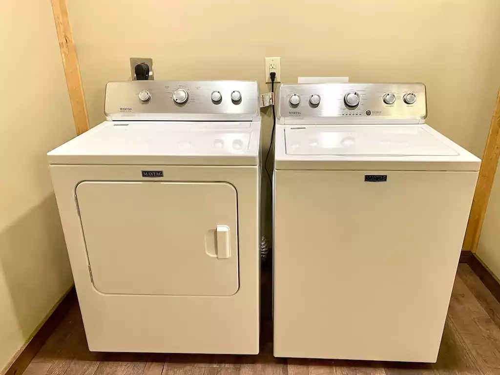 Laundry area with full size washer/dryer available for guests in lower bathroom - Black Bear Retreat - Townsend