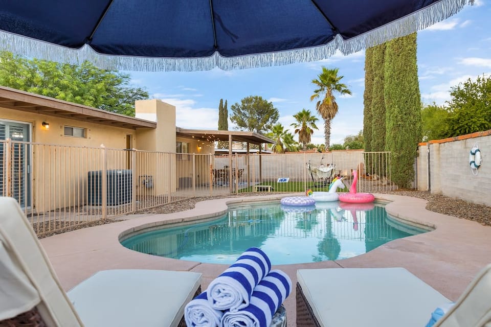 Enjoy the warm sun and soak in the gorgeous pool