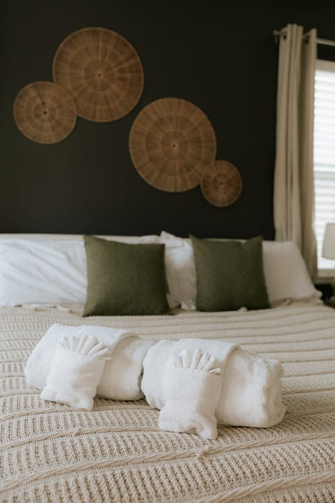 Cozy modern bedroom with luxe linens and stylish earthy accents
