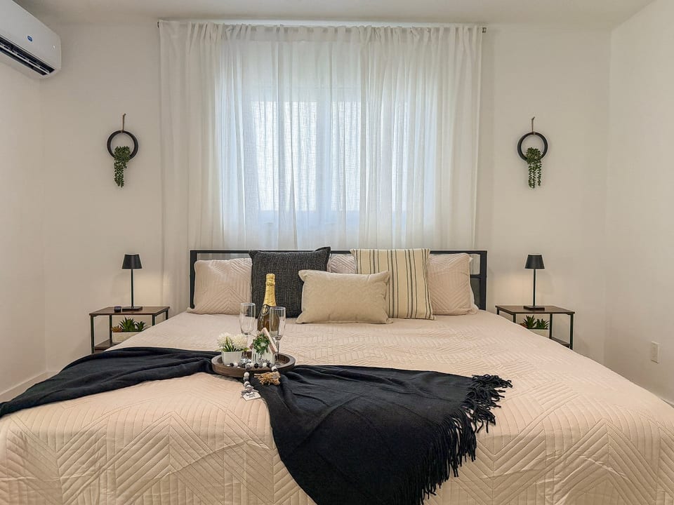 This beautifully styled bedroom is a true sanctuary: Simplicity and comfort combine to make your stay unforgettable.
