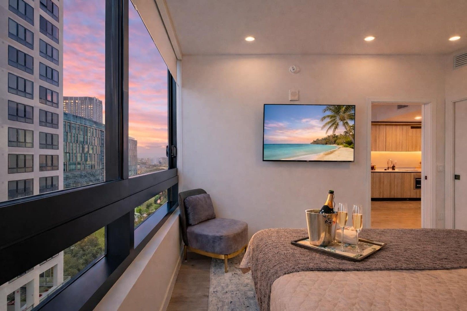 City View Retreat: Enjoy sunset hues through expansive windows in this chic space!
