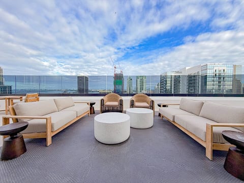 Rooftop Lounge: Unwind with stunning skyline views from this chic, stylish outdoor oasis!