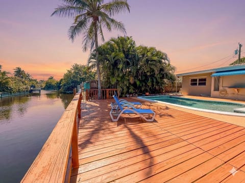 Relax on your private waterfront deck, perfect for sunbathing by the canal.
