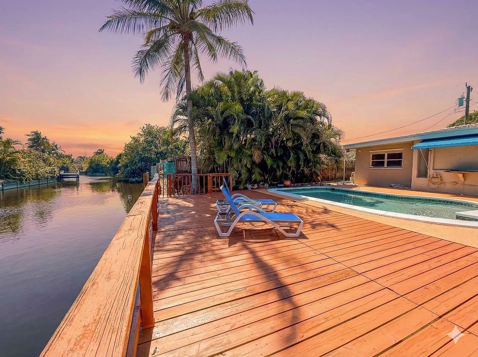 Relax on your private waterfront deck, perfect for sunbathing by the canal.