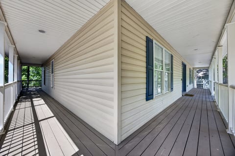 Spacious covered wraparound porch with room to relax outdoors