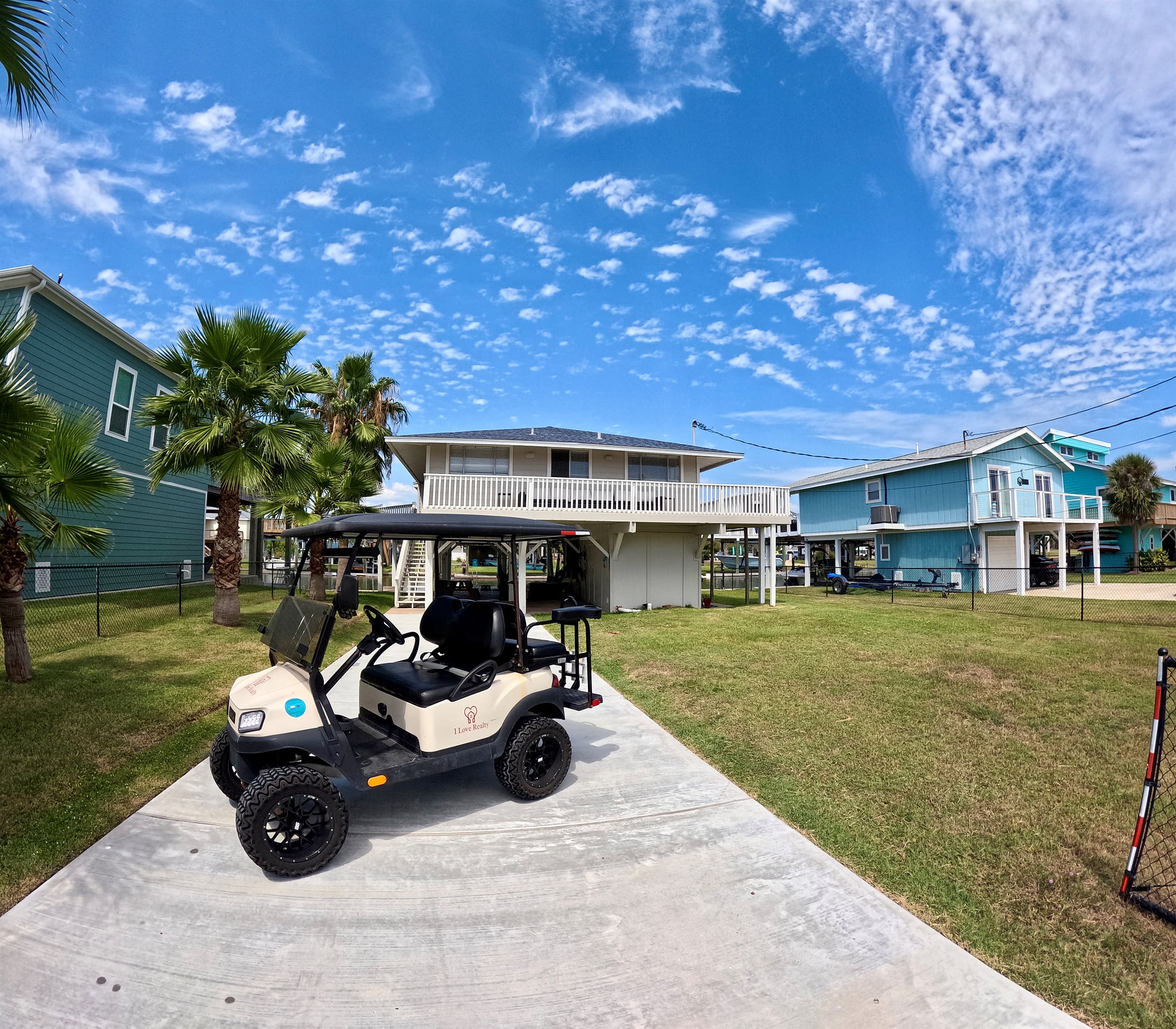 Front of the home with golf cart