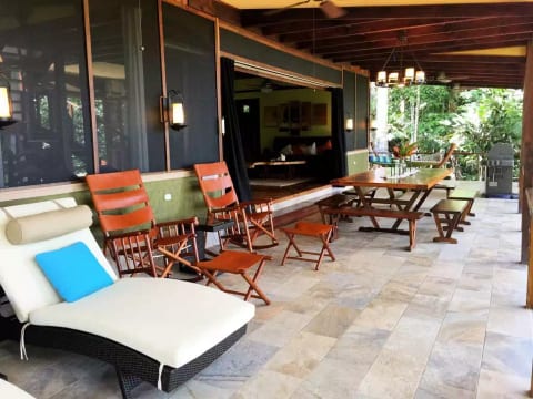 The 700 sqft covered back deck is our favorite room in the house.