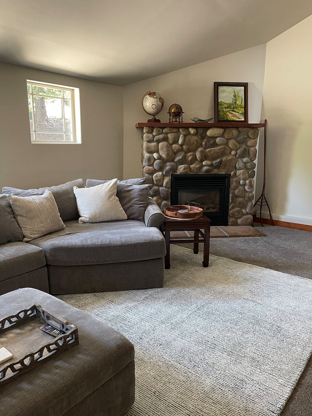 Spacious Family Room with River Rock Fireplace