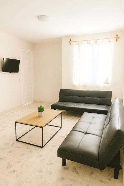 Another view of the main lounge area—clean, modern, and inviting.