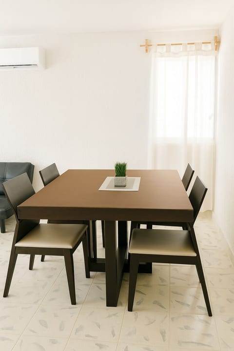 Cozy dining area ideal for meals, work, or planning your adventures.