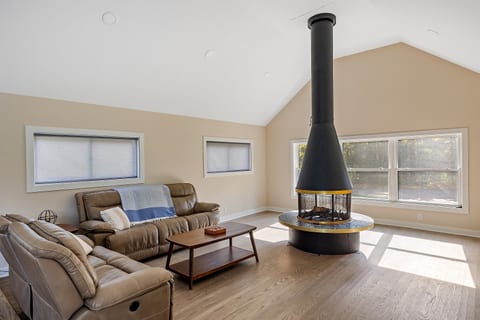 Wood burning fireplace in the living room.