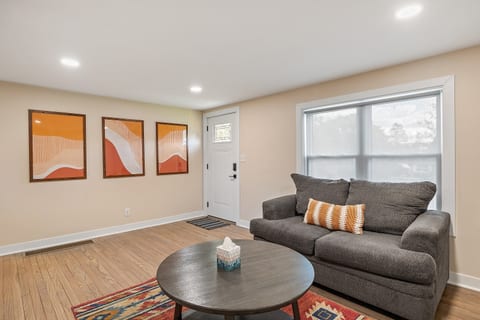 Sitting living room and entry way to the house.