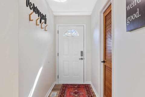 Entryway and entrance to Laundry Room