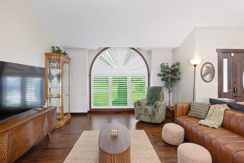 Bright living room with large picture window.