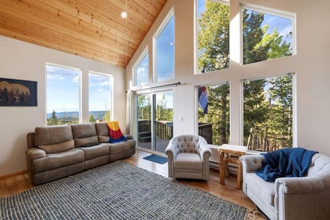 Living Room with beautiful views of Woodland Park