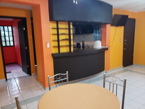 Bright open layout connecting the kitchen and dining space.