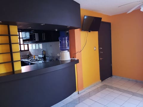 Additional kitchen angle showing extra counter space.