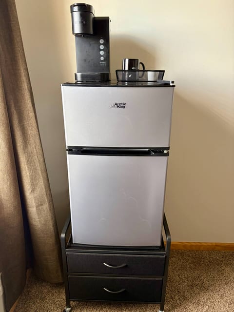 Comfy Queen Room - Compact Fridge/Coffee Station, Keurig coffee maker and storage unit.