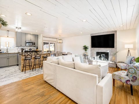 Step inside and the trip starts to feel settled: an open living, dining, and kitchen space where everyone can land in one place.