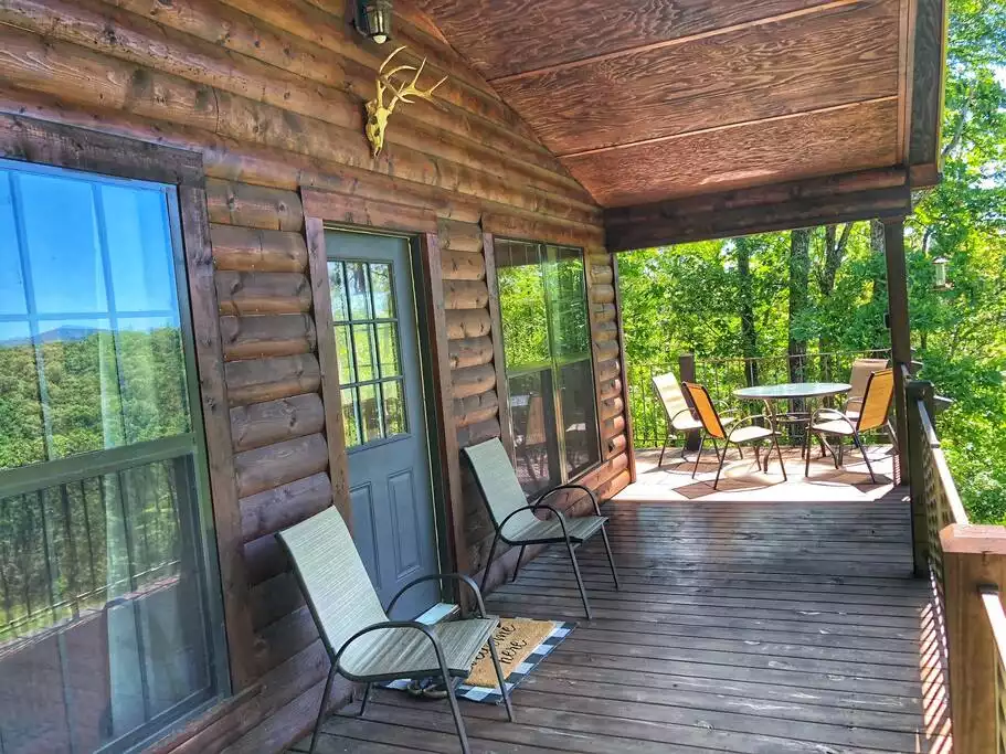 Large deck with table and chairs