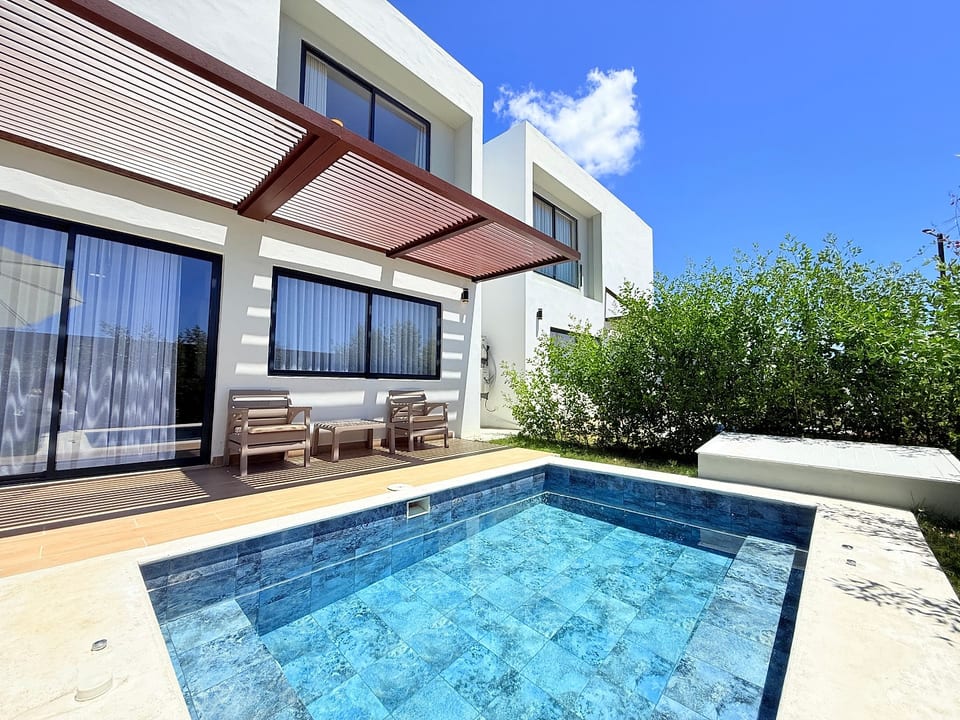 Private pool with lounge chairs—your tropical oasis in Vista Cana, Punta Cana.