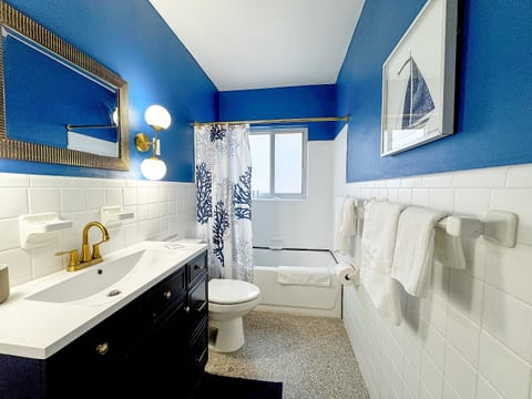 Fenced backyard • King bedroom • Beach nearby