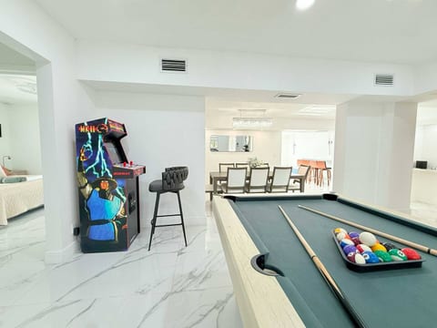 Game room with arcade fun—endless entertainment for kids and adults alike!