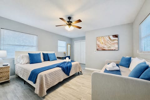 Relaxation meets vibrancy: Natural light and sleek design make this bedroom ideal for unwinding, with vibrant touches that inspire and refresh 