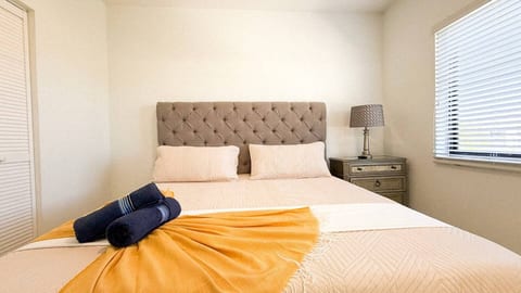 Bedroom with neutral tones—peaceful retreat with hotel-quality linens.