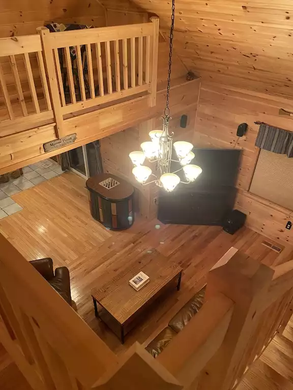 View of living room from loft. - Red Fox Retreat - Bridgton