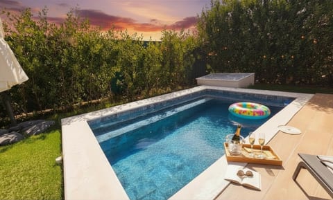 A peaceful poolside setting—perfect for slow mornings and golden sunsets in Vista Cana.