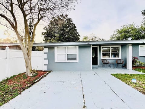 Cozy curb appeal in Lakeland, Florida! This single-story home with a shaded patio, stylish facade & peaceful yard is perfect for couples, solo travelers, or long-term guests seeking comfort, privacy, and a relaxing stay near nature.