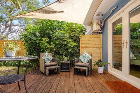 Unwind in your private patio oasis at Hollywood, Florida! Shaded seating, lush greenery, and cozy vibes make this the perfect spot for morning coffee or evening chats. Ideal for long stays and beachside relaxation.