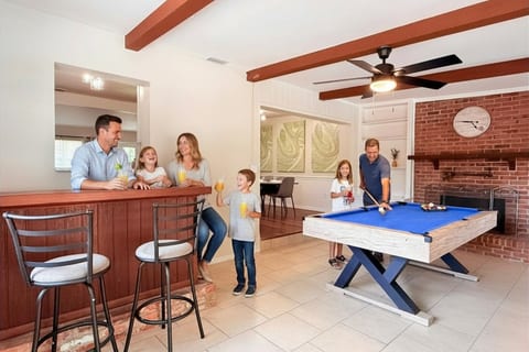 Fun-filled game room with pool table and bar area – perfect for family entertainment at Oh Winter Heaven, Winter Haven FL
