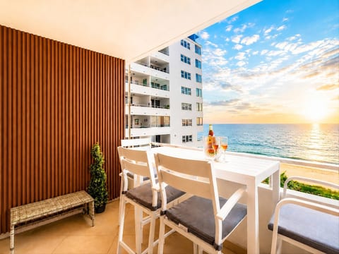 Ocean Manor rooftop terrace—dine al fresco with panoramic sunset views over the Atlantic.