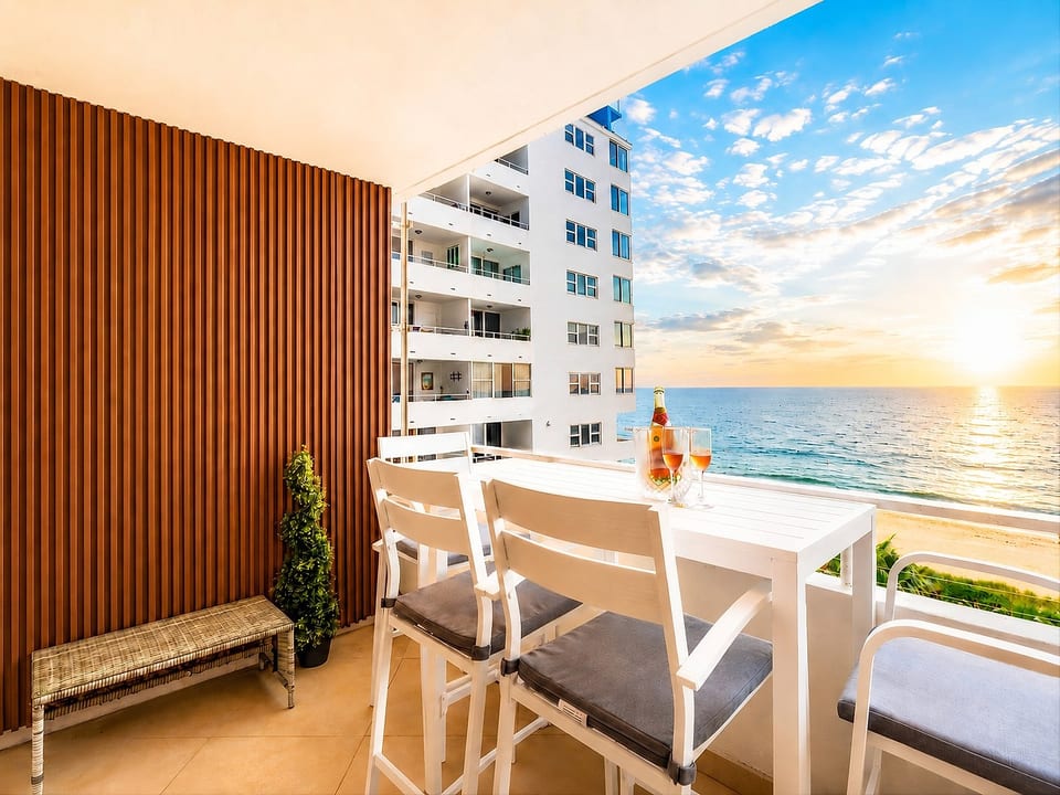 Ocean Manor rooftop terrace—dine al fresco with panoramic sunset views over the Atlantic.