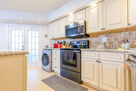 In-unit washer/dryer in the kitchen—convenient laundry for extended beach stays.