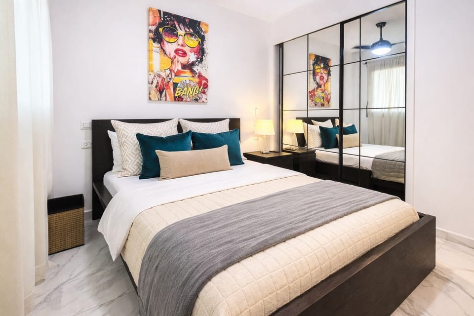 A bedroom designed for comfort and calm: Soft textures, cozy details, and the perfect space to unwind