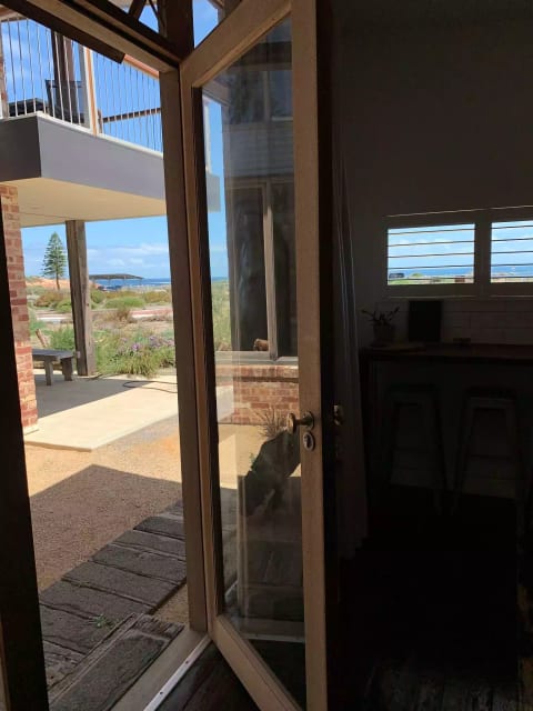 Private - self contained apartment with beach view
