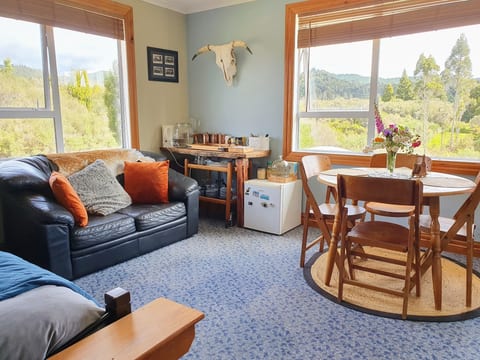 Beautiful farm views from the dining area, warm comfortable beds and TV for entertainment in the evening.