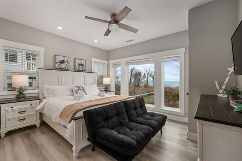 Serene bedroom retreat w/ soft tones, comfy bedding & a calm, airy feel.