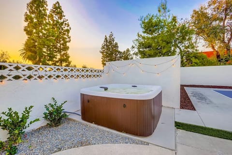 Private hot tub tucked into the yard, perfect for unwinding after a full day out.