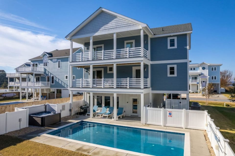 Three-story coastal home w/ private pool, hot tub & fenced deck space for the whole group.