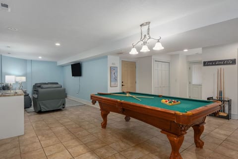 Classic pool table in the game room — gather the group for a friendly round any time of day.