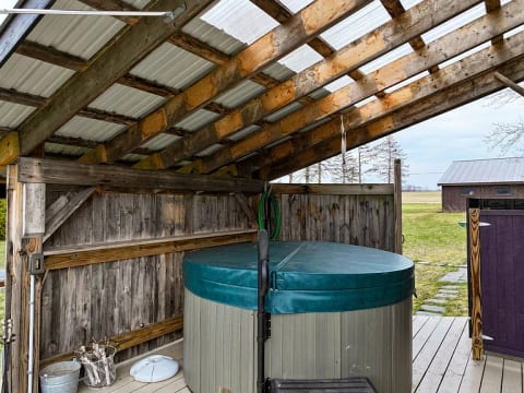 Hot tub with outdoor shower
