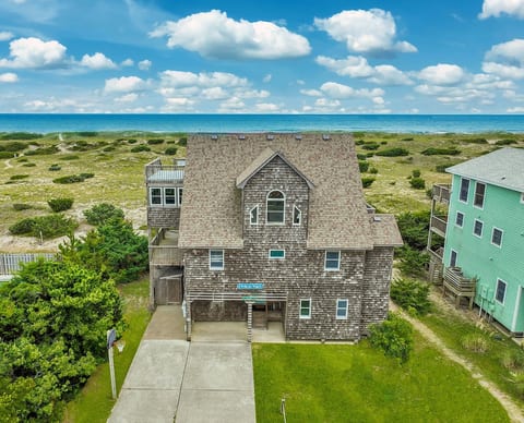 Pelican Watch! Where the Atlantic Ocean is your backyard! Located in the village of Salvo on Hatteras Island in the highly sought after neighborhood of Hatteras Colony.