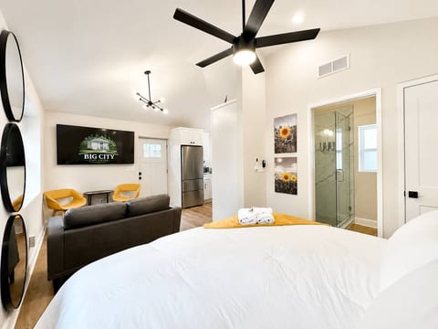 Experience restful nights on a king-sized memory foam mattress in this cozy tiny home. Perfect for a luxurious sleep while enjoying the charm and efficiency of compact living!
