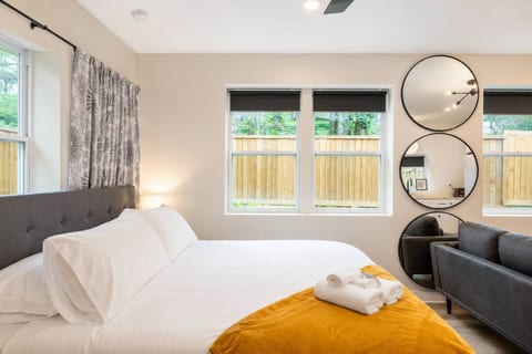 Perfect for couples or solo adventurers! Enjoy a cozy retreat in this tiny home featuring a luxurious king-sized memory foam mattress for restful nights with extra pillows and plush bedding. Your next getaway starts here!