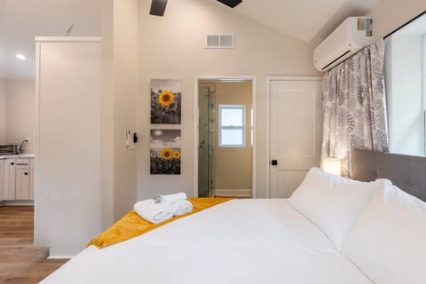 Pamper yourself with a walk-in shower and drift into blissful sleep on a king-sized memory foam mattress. This tiny home combines modern comforts with luxury for a refreshing and restful stay!