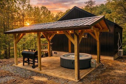 Tucked into the quiet woods of Cosby, this romantic cabin escape is where forest views, mountain air, and total privacy set the mood—just minutes from the Great Smoky Mountains and far from the crowds.